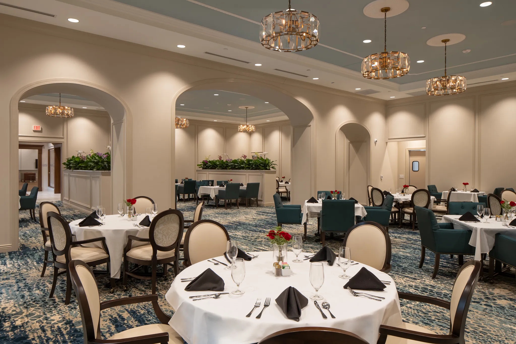 Elegant dining room with patterned carpet flooring