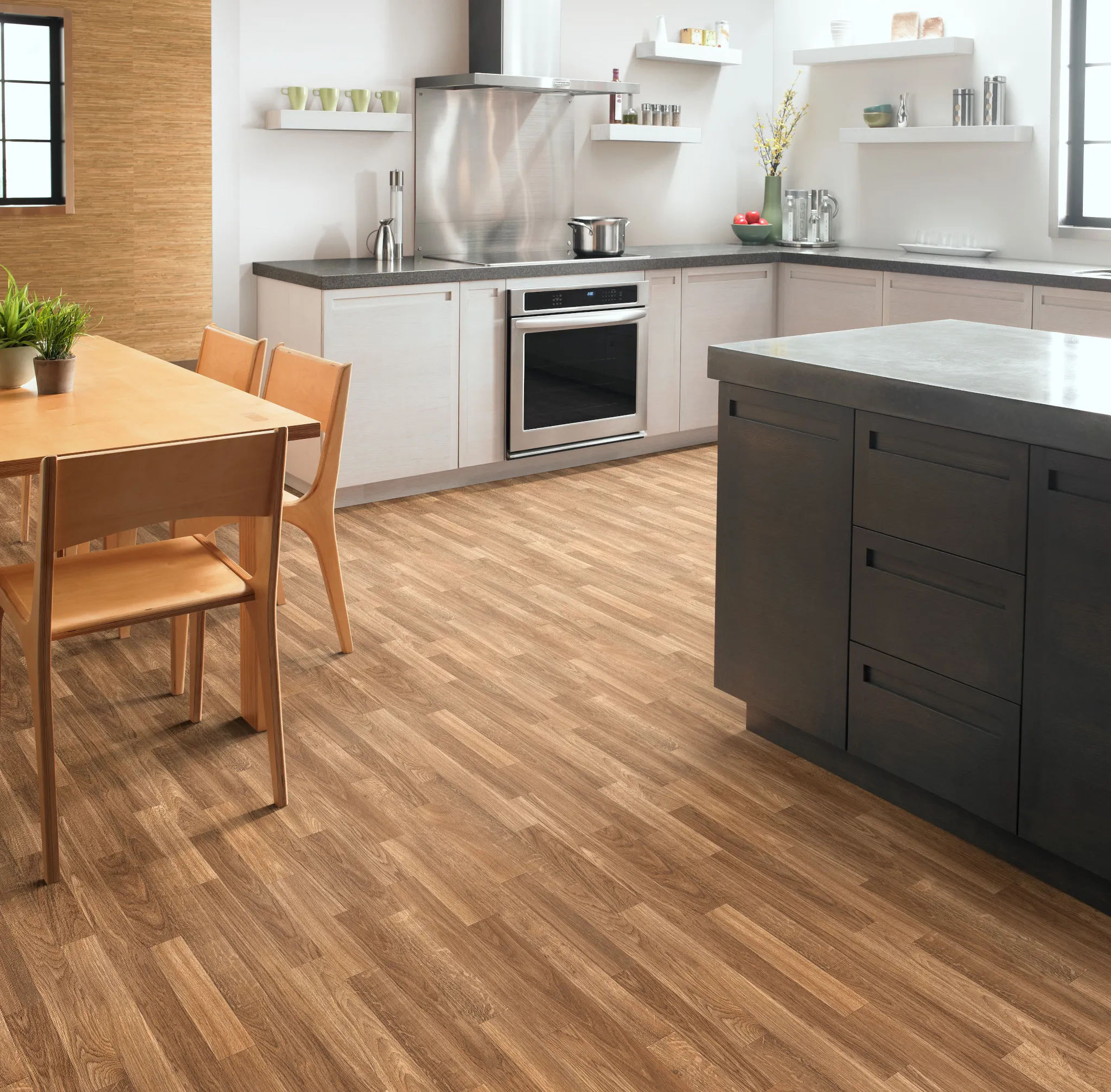 Modern kitchen with light wood flooring and contemporary furniture