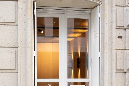 COREtec Floors and Triplaco Window Display Exterior view of a window with COREtec Floors and Triplaco branding