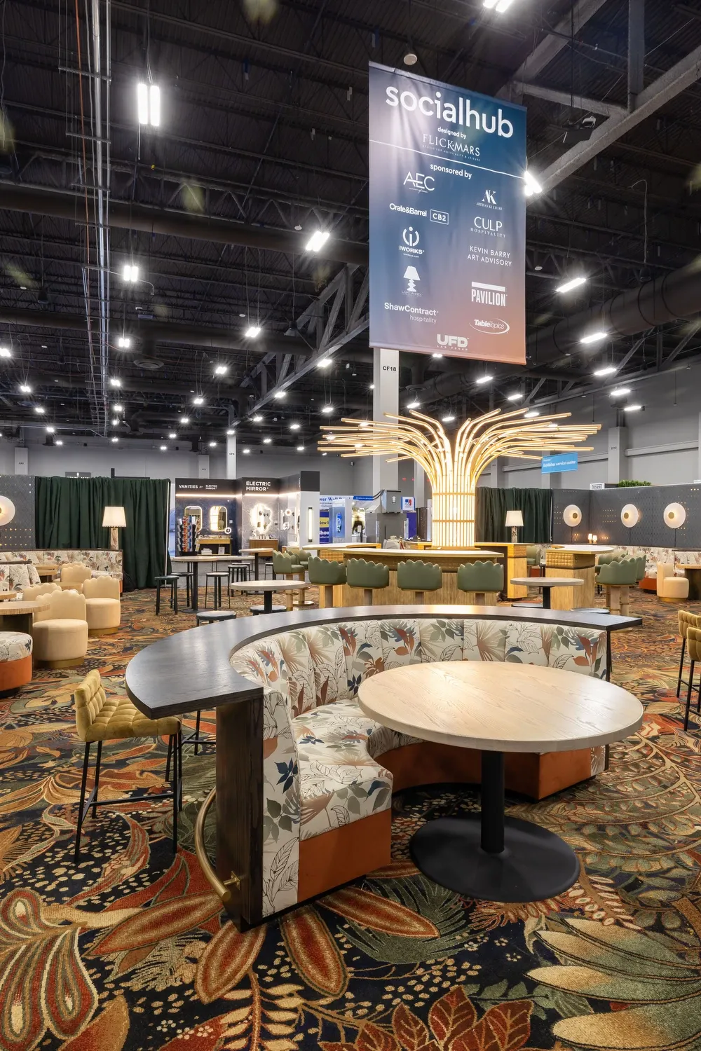 Hospitality facility with floral patterned carpet and modern seating