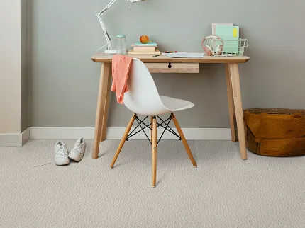 Patterned Carpet Flooring in Cozy Home Office Setting for Everyday Comfort and Style Cozy home office with patterned carpet flooring, featuring a wooden desk, white chair, and soft decor elements for a comfortable and practical lifestyle