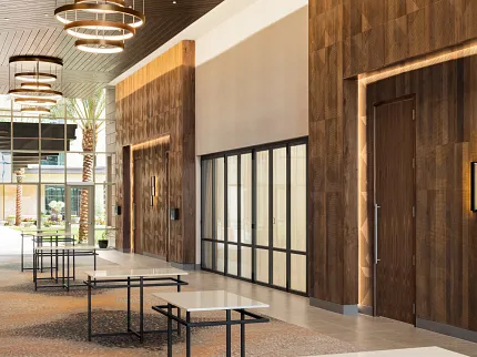 Modern Hospitality Facility with Commercial Carpet Tile Flooring Spacious hospitality facility with modern design featuring commercial carpet tile in a blend of brown and beige tones