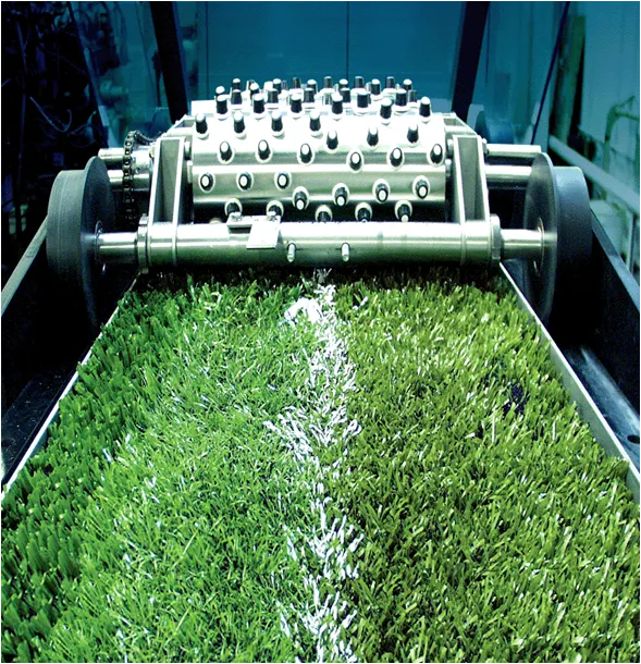 Artificial turf manufacturing process with machinery