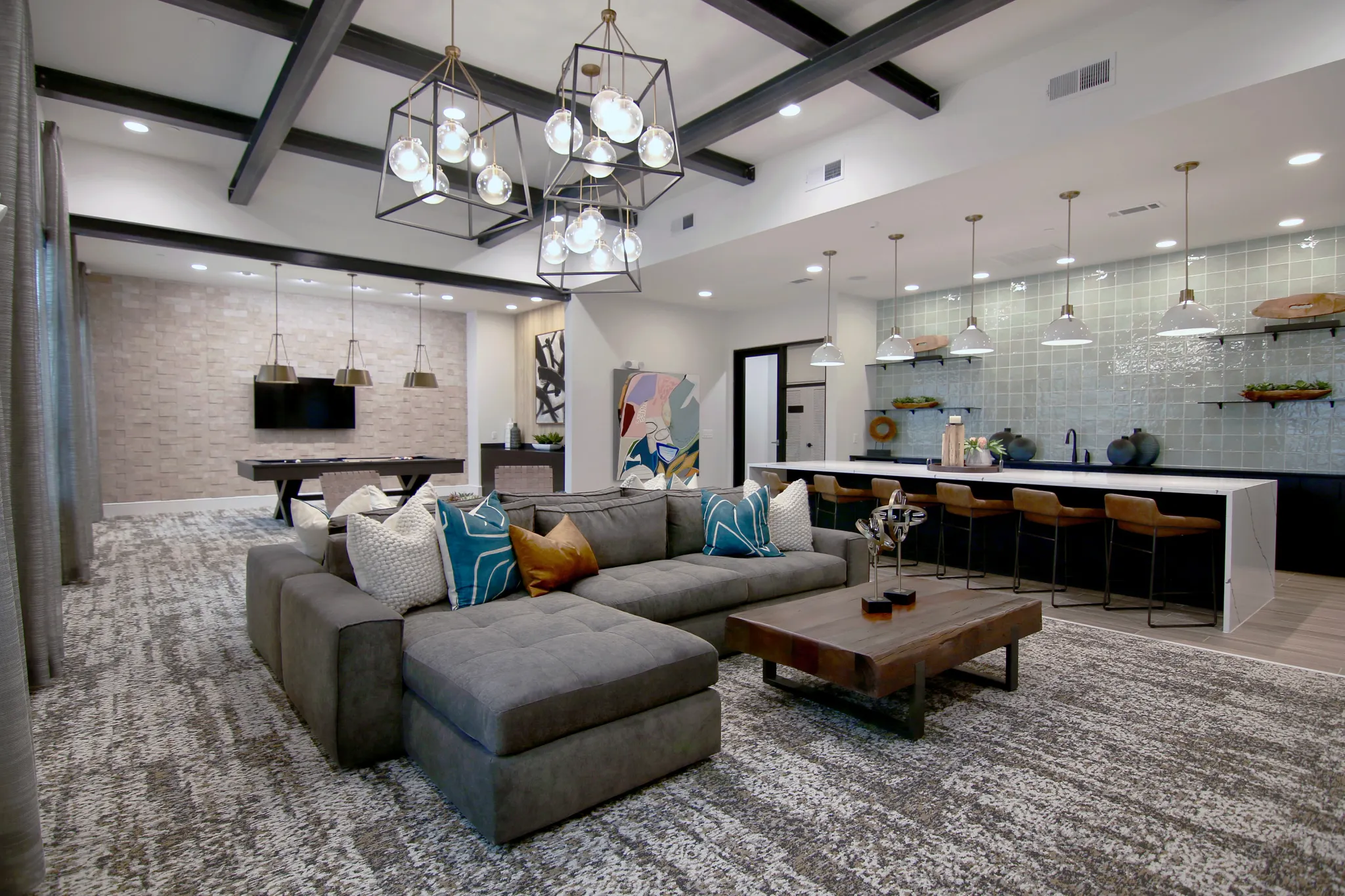 Modern living room with plush carpet flooring and stylish decor