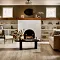 <h2 class="text-bodycopy-l"><span style="color:#ffffff;"><strong>Need Design Help?</strong></span></h2>
Cozy living room with SPC flooring in natural wood tones, featuring a white brick fireplace, comfortable seating, and decorative elements