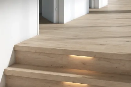 Light Oak Wood Look Luxury Vinyl Plank Flooring in Modern Hallway Modern residential hallway with light oak wood look luxury vinyl plank flooring and illuminated steps