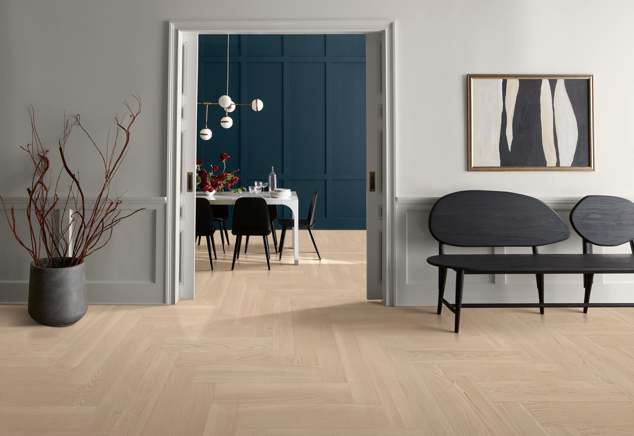 Modern dining room with light hardwood flooring and contemporary decor