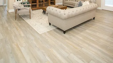 Modern Living Room with Wood-Look LVP Flooring Spacious living room with beige sofas and wood-look luxury vinyl plank flooring