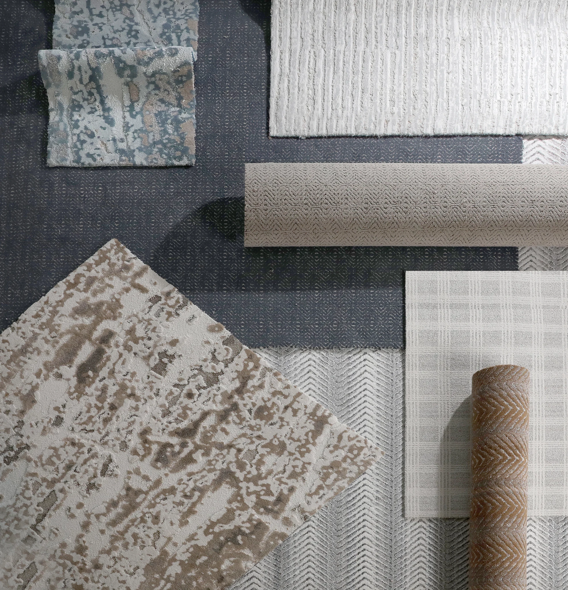 Assorted carpet swatches in various textures and patterns including beige