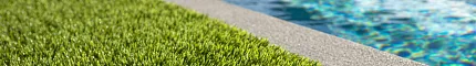 Artificial grass beside a swimming pool