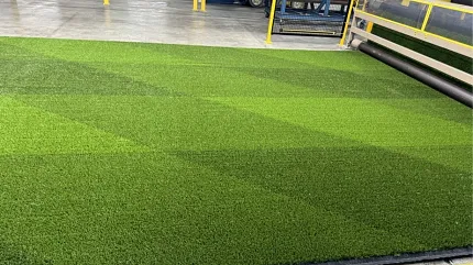 High-quality synthetic grass production process Green artificial turf in manufacturing facility