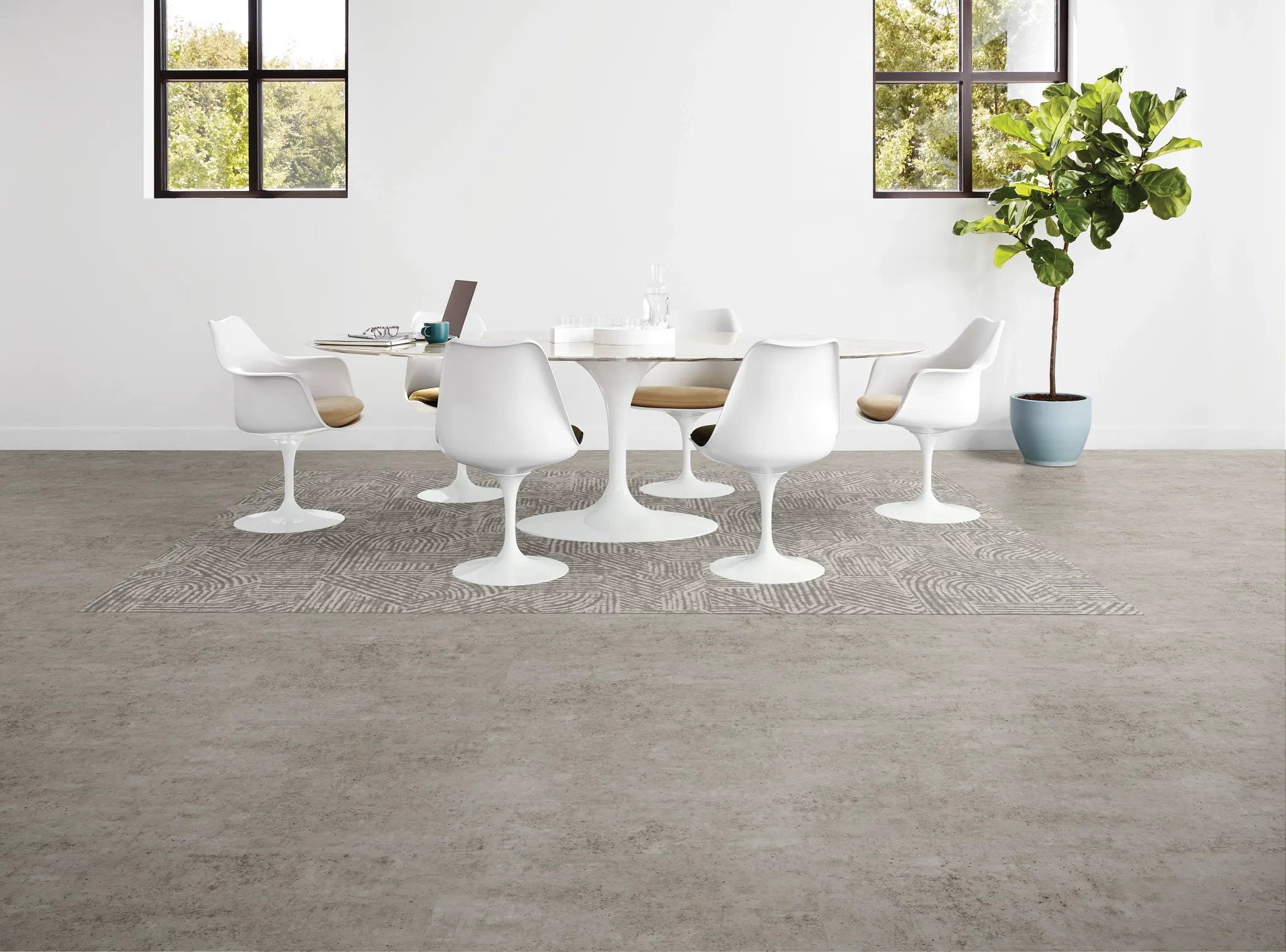 Heavy commercial luxury vinyl tile flooring in a modern workplace setting