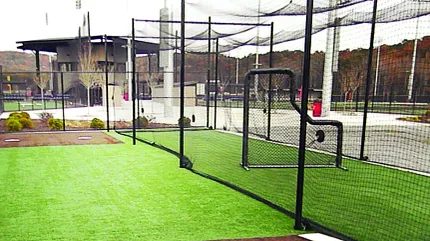 Durable artificial turf for sports complexes Outdoor sports facility with artificial turf and netting
