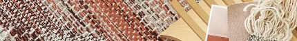 Textured Commercial Carpet Tile in Rust, Brown, and Cream with Wooden Chair and Fabric Swatches Close-up of a textured commercial carpet tile in shades of rust, brown, and cream with a wooden chair and fabric swatches