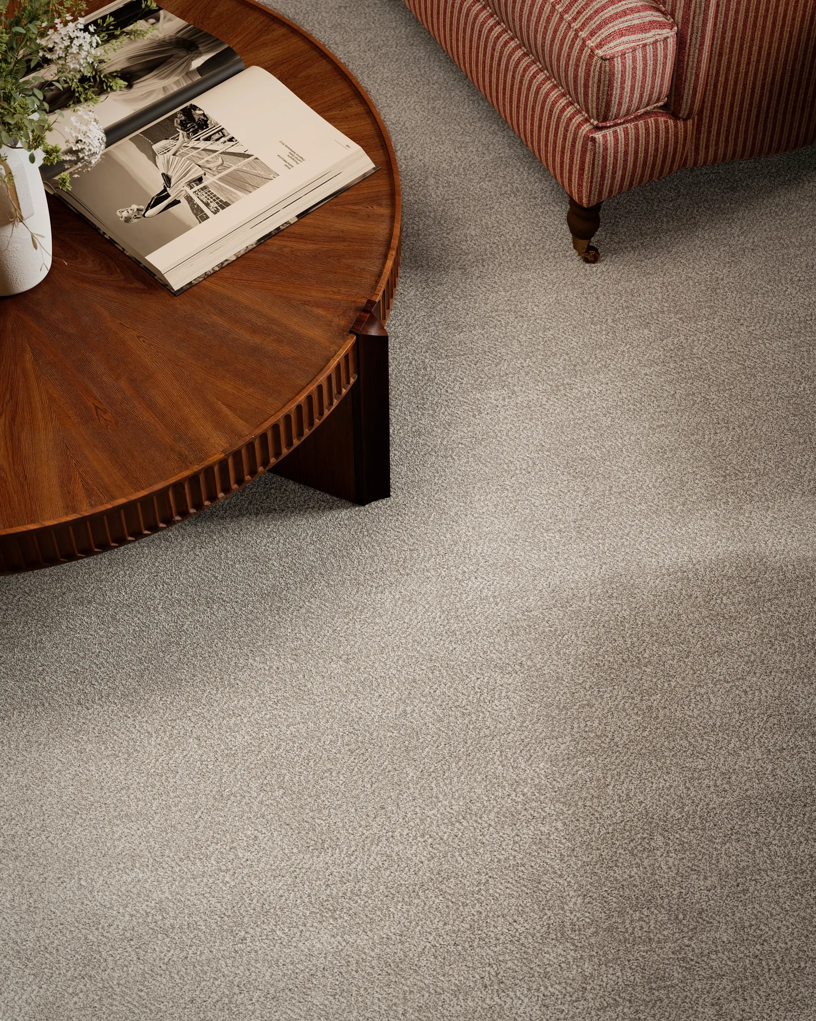 Cozy living room with plush carpet flooring featuring a subtle textured pattern, two olive green armchairs, and a chess table