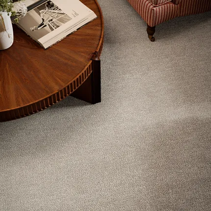 Elegant Living Room with Textured Carpet Flooring and Olive Green Armchairs Cozy living room with plush carpet flooring featuring a subtle textured pattern, two olive green armchairs, and a chess table