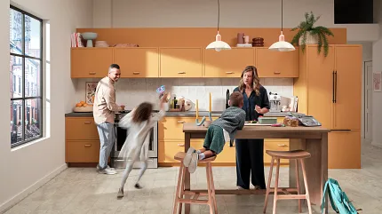 Coretec Residential WPC Luxury Vinyl Tile Flooring in Modern Kitchen - Light Stone Look kitchen with luxury vinyl tile floor in a light stone look with a family interacting around a kitchen island