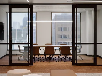 Contemporary Workplace Design with Commercial Carpet Tile Flooring Modern office space with brown carpet tiles and beige seating area
