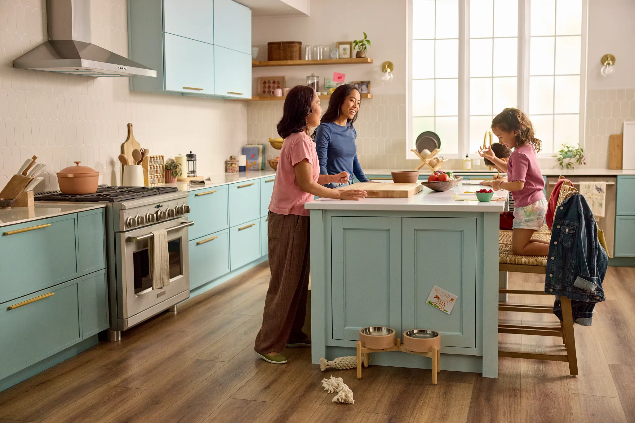 Cozy kitchen with durable hardwood flooring and family interaction