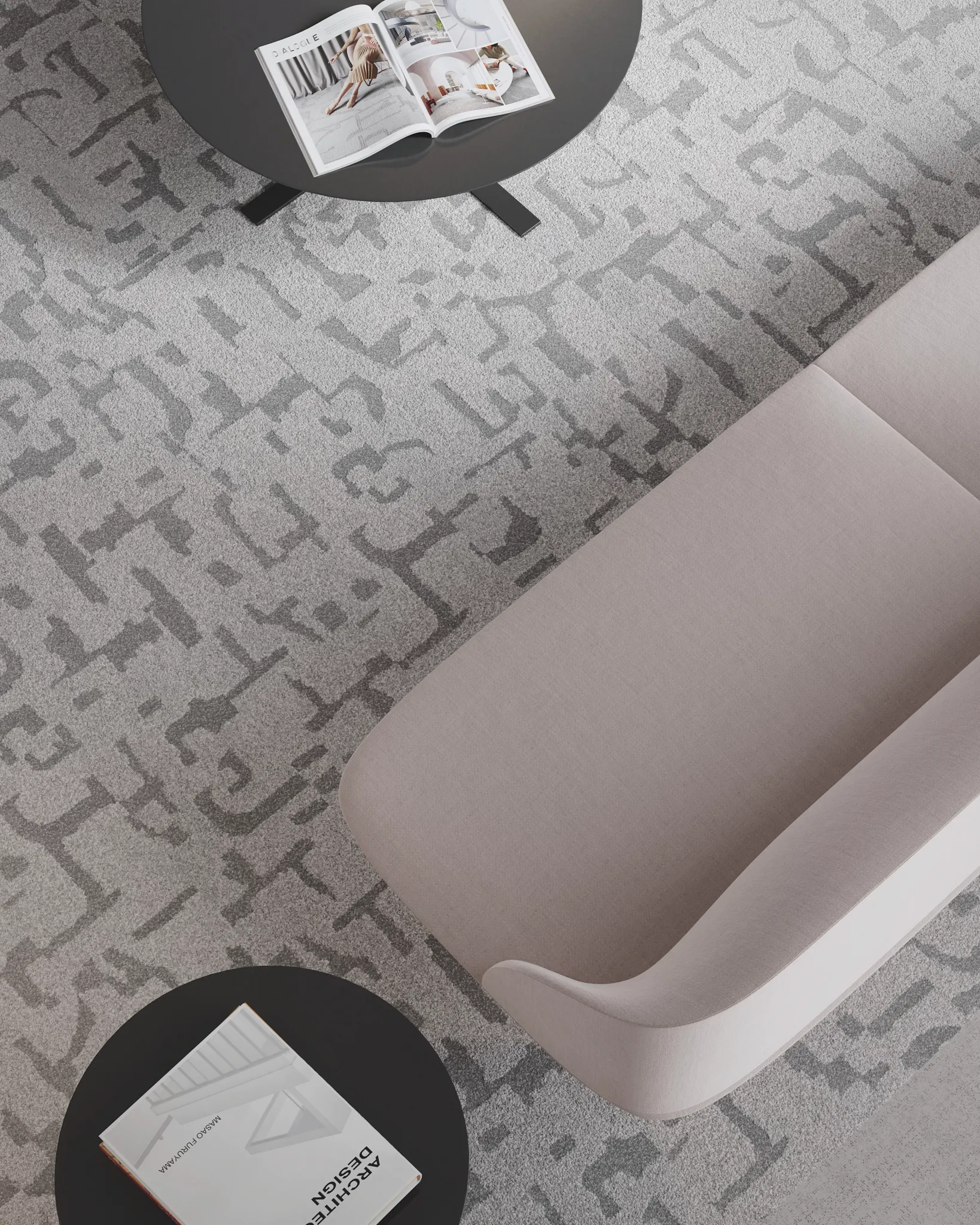 Modern office lounge with light gray patterned commercial carpet tile, featuring a sleek black coffee table and a light pink sofa