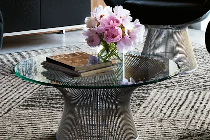 Contemporary Office Lounge with Commercial Carpet Tile Flooring Modern office lounge with abstract art and plush black chairs on patterned commercial carpet tile