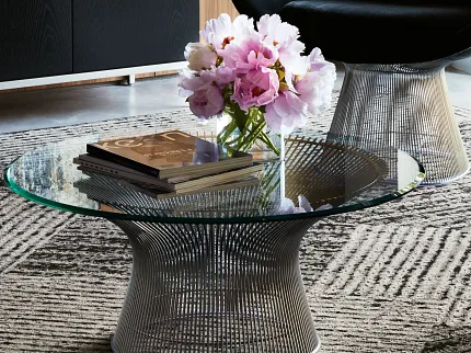 Contemporary Office Lounge with Commercial Carpet Tile Flooring Modern office lounge with abstract art and plush black chairs on patterned commercial carpet tile