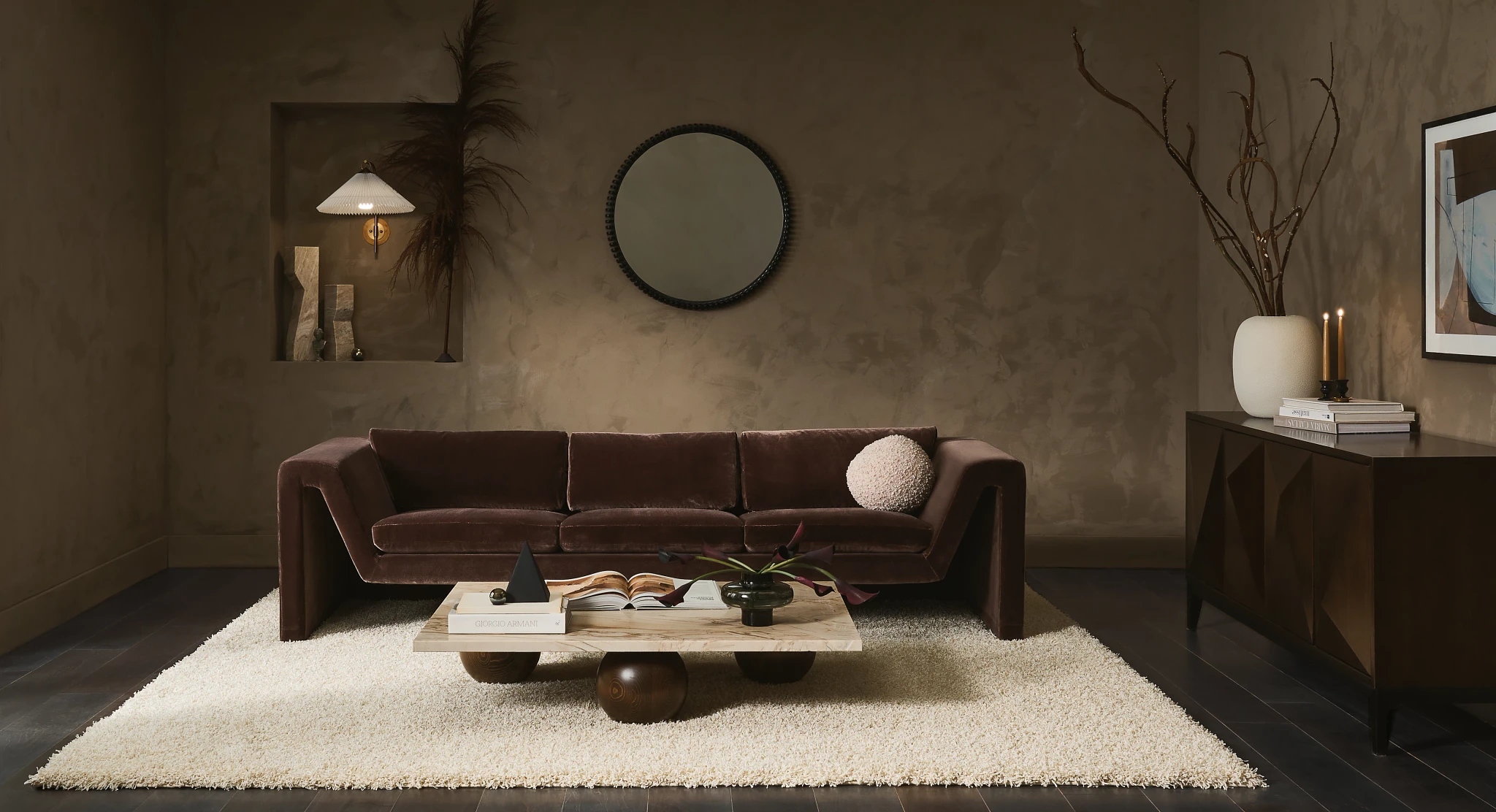modern moody living room velvet couch and shaggy rug