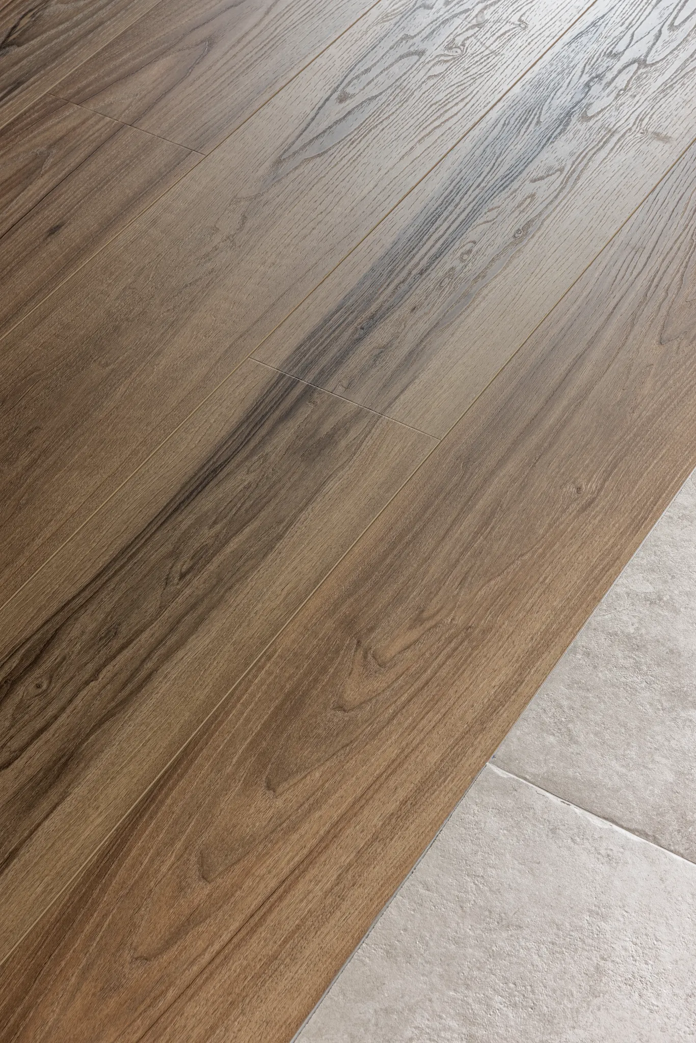 Wood oak look luxury vinyl plank floor shade dark brown in industrial home