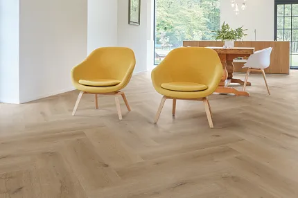 Light Wood Look LVP Flooring in Modern Living Room Modern living room with light wood look luxury vinyl plank flooring and yellow chairs