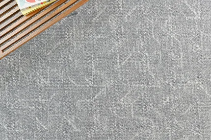 24x24 inch Grey Commercial Carpet Tile with Geometric Pattern Grey commercial carpet tile with geometric pattern and wooden bench