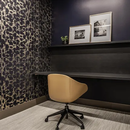 Contemporary workspace with 9x36 inch carpet tile flooring Modern office with beige carpet tile flooring and stylish decor