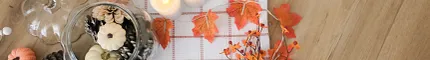 Wood Look Luxury Vinyl Flooring with Autumn Decor - Durable and Stylish Autumn-themed decor on wood look luxury vinyl flooring with candles, pumpkins, and leaves