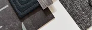 Stylish carpet designs for modern interiors Assorted carpet swatches in black, white, and dark teal
