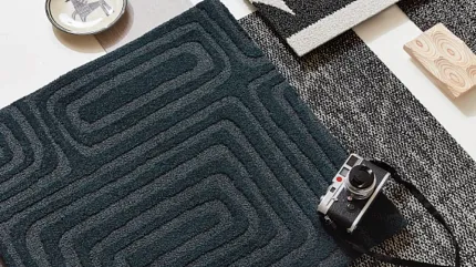 Stylish carpet designs for modern interiors Assorted carpet swatches in black, white, and dark teal
