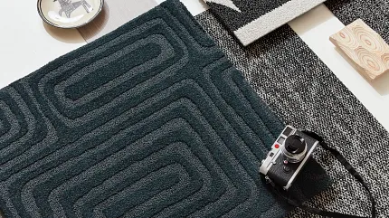Modern carpet design palette with geometric patterns in black, white, and dark teal Design palette featuring carpet swatches in black, white, and dark teal with geometric patterns