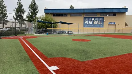 Synthetic turf baseball field for sports facilities Baseball field with artificial turf and red clay markings