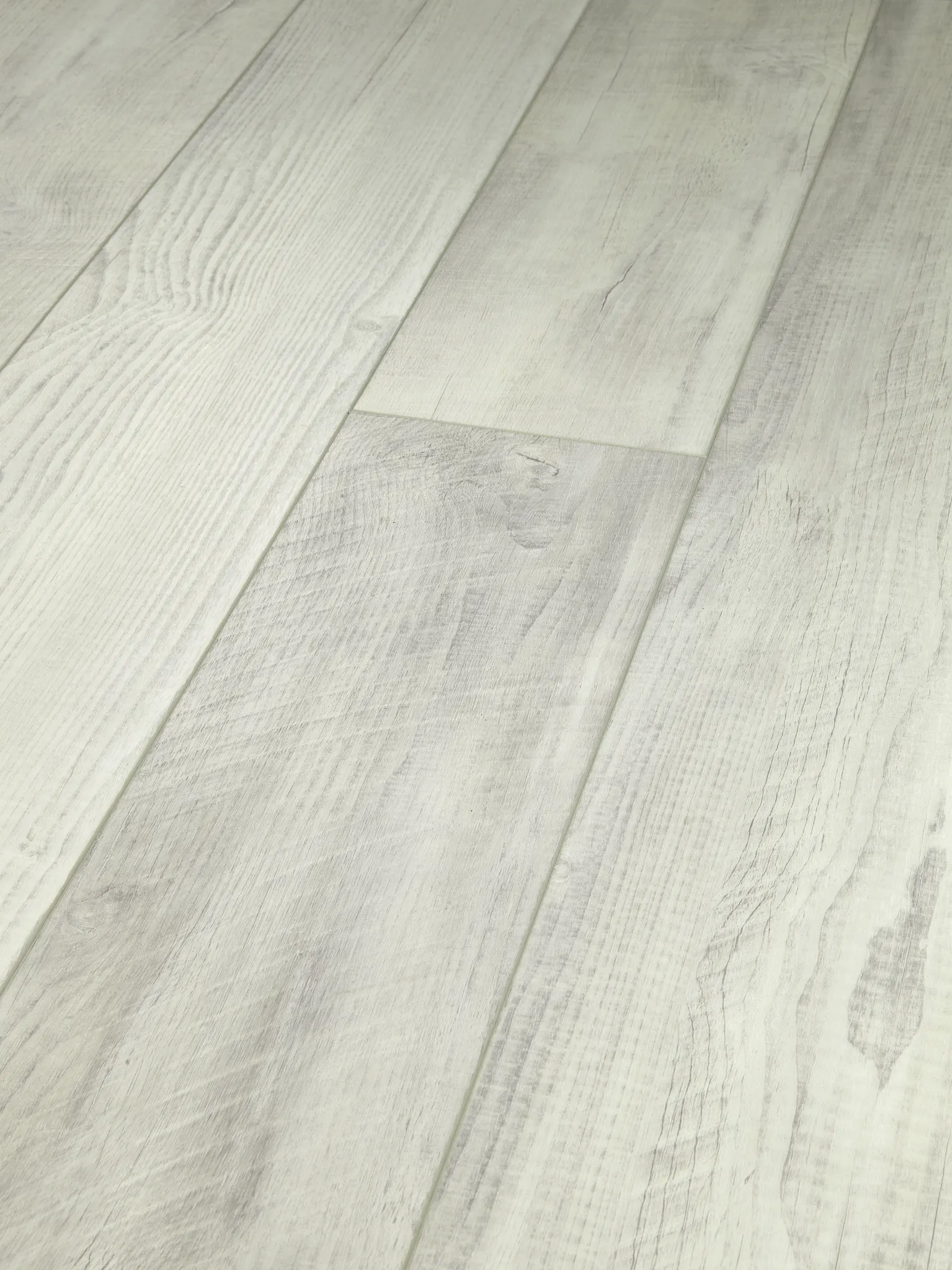 White hardwood flooring with visible wood grain texture