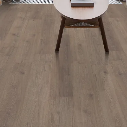 Warm Brown Laminate Flooring for Comfortable Living Spaces Cozy living room with a wooden coffee table on durable laminate flooring in a warm brown tone