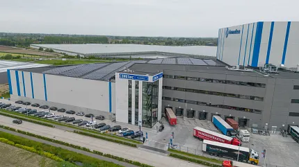 COREtec Floors Manufacturing Facility - Innovation in Vinyl Flooring Production Aerial view of COREtec Floors manufacturing facility showcasing modern architecture and logistics operations