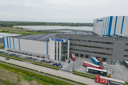 COREtec Floors Manufacturing Facility - Innovation in Vinyl Flooring Production Aerial view of COREtec Floors manufacturing facility showcasing modern architecture and logistics operations
