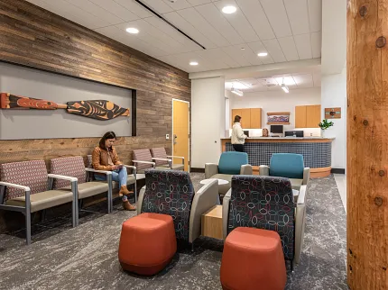 Stylish flooring for contemporary commercial spaces Modern waiting area with textured flooring and wooden wall accents