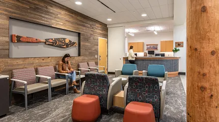 Stylish flooring for contemporary commercial spaces Modern waiting area with textured flooring and wooden wall accents