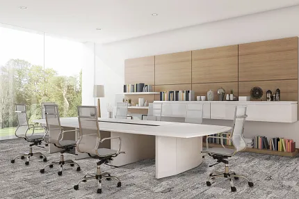 Contemporary Workplace Design with Gray Commercial Carpet Tile Modern office space with large windows, white desks, and ergonomic chairs on gray commercial carpet tile