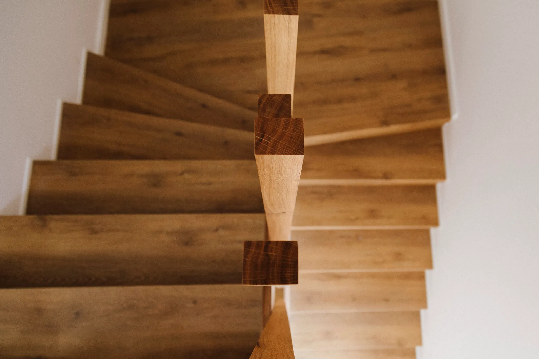 Wooden brown stairs with Coretec LVT flooring
