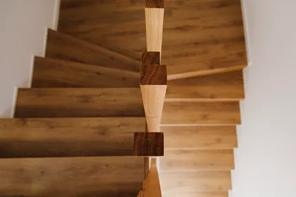 Wooden brown stairs with Coretec LVT flooring