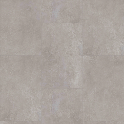 A warm gray vinyl tile floor with stone look
