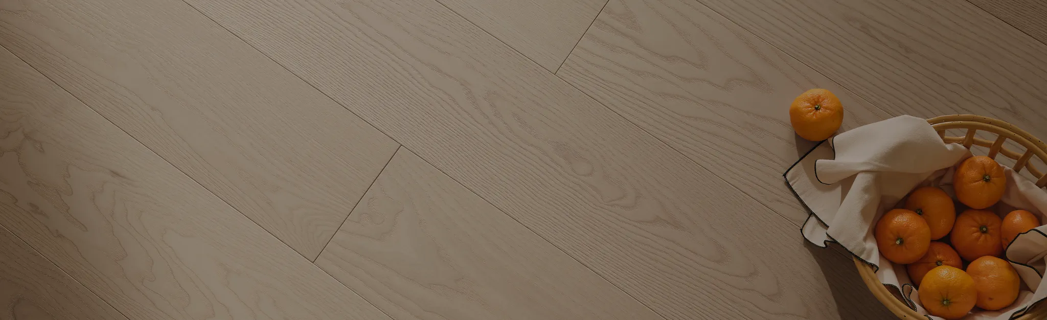 Light hardwood flooring with green potted plants