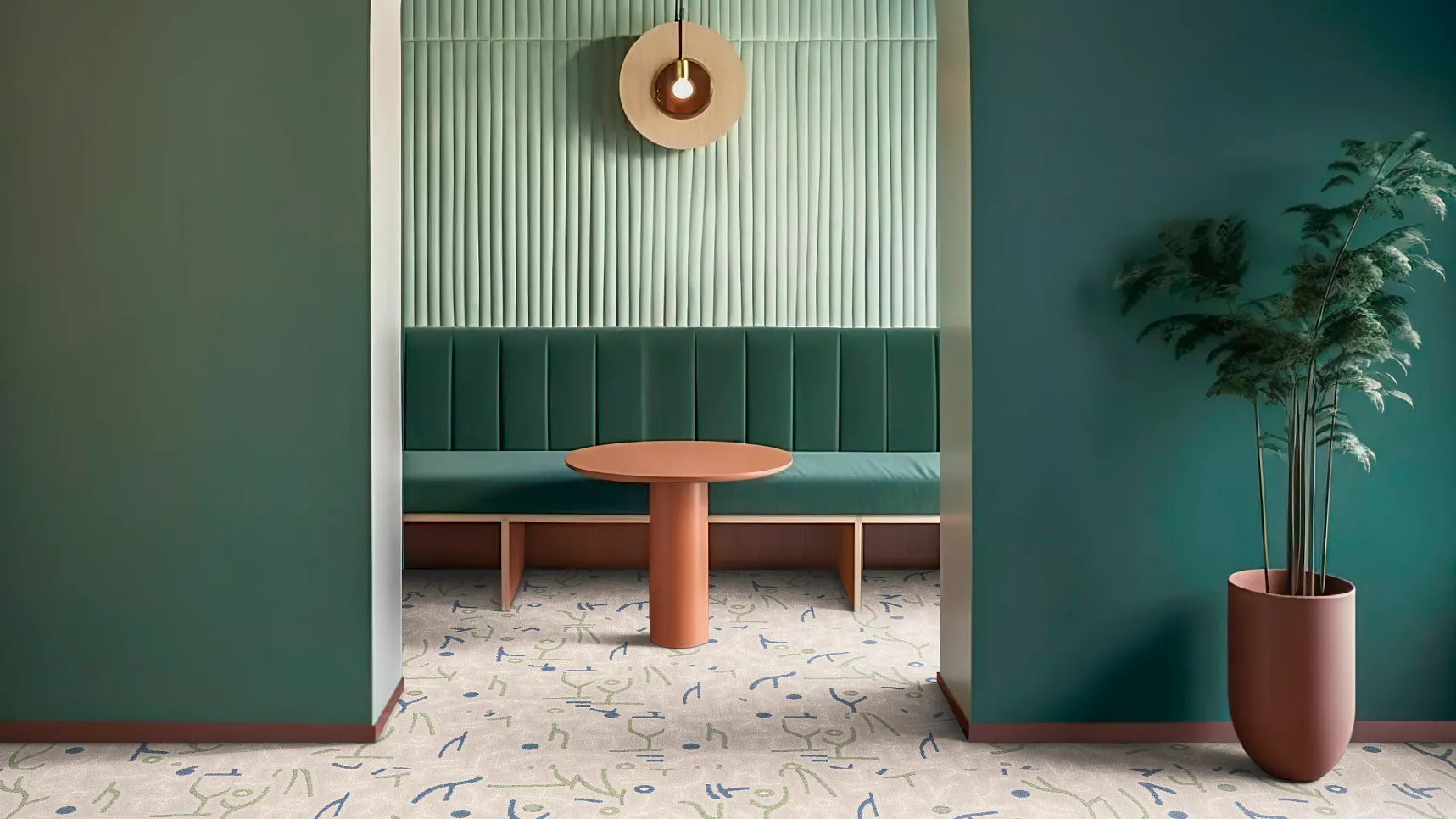 room with beige and green carpet tile and a green accent wall