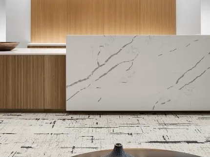 Contemporary Workplace Design with Marble and Wood Elements Modern workplace interior with a marble reception desk, wooden paneling, and contemporary furniture