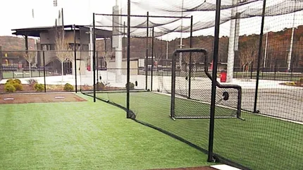 Durable artificial turf for sports facilities Outdoor sports field with artificial turf and netting